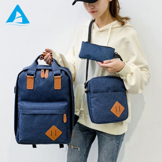 Nuevo Conjunto de mochila escolar resistente al agua 3 en 1 para ordenador portátil Unisex con bandolera estilo USB a la moda y estuche para lápices